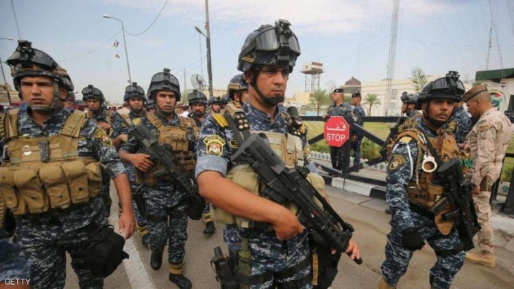 أفراد من من الشرطة العراقية يتبعون وزارة الداخلية