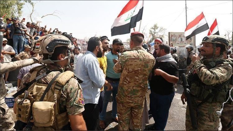 لماذا يحجم العرب السُنّة عن المشاركة في الاحتجاجات العراقية؟