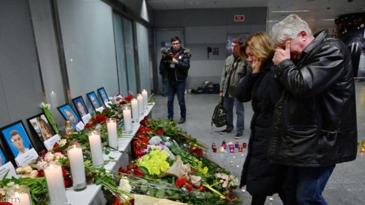 أوكرانيون يبكون على أقاربهم الذين قضوا في كارثة الطائرة